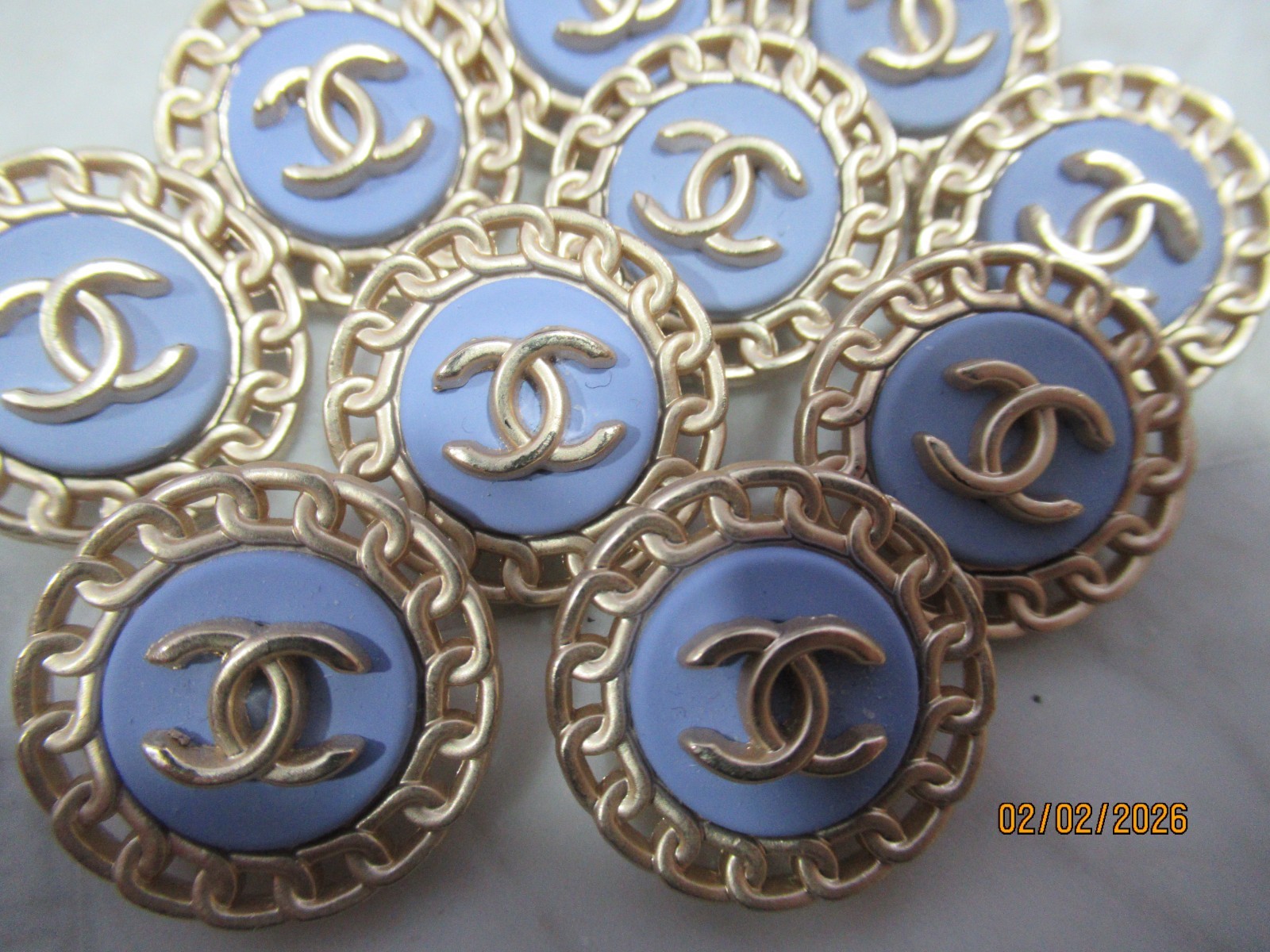 CHANEL 10 BUTTONS  23 MM, matte gold tone, metal , blue THIS IS FOR 10