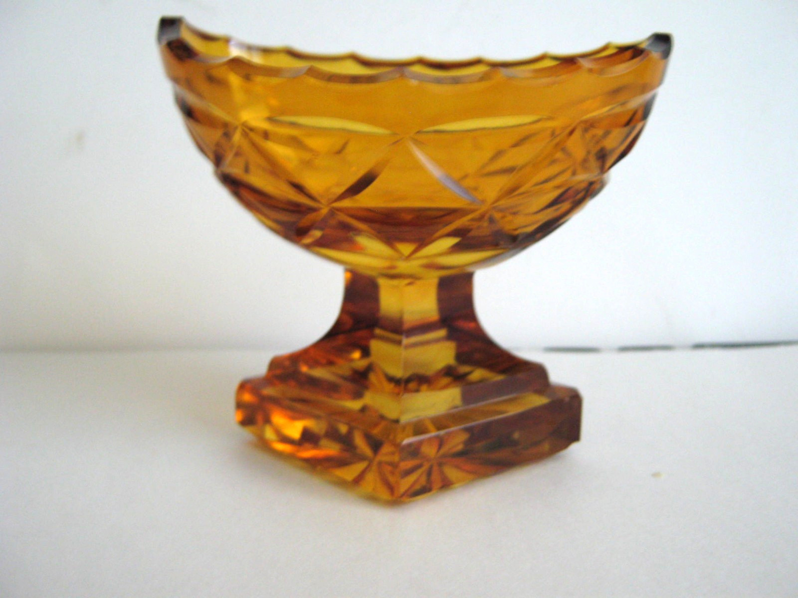 AMBER CUT GLASS OVAL BOAT SHAPED PEDESTAL OPEN SALT CELLAR w/TIERED BASE
