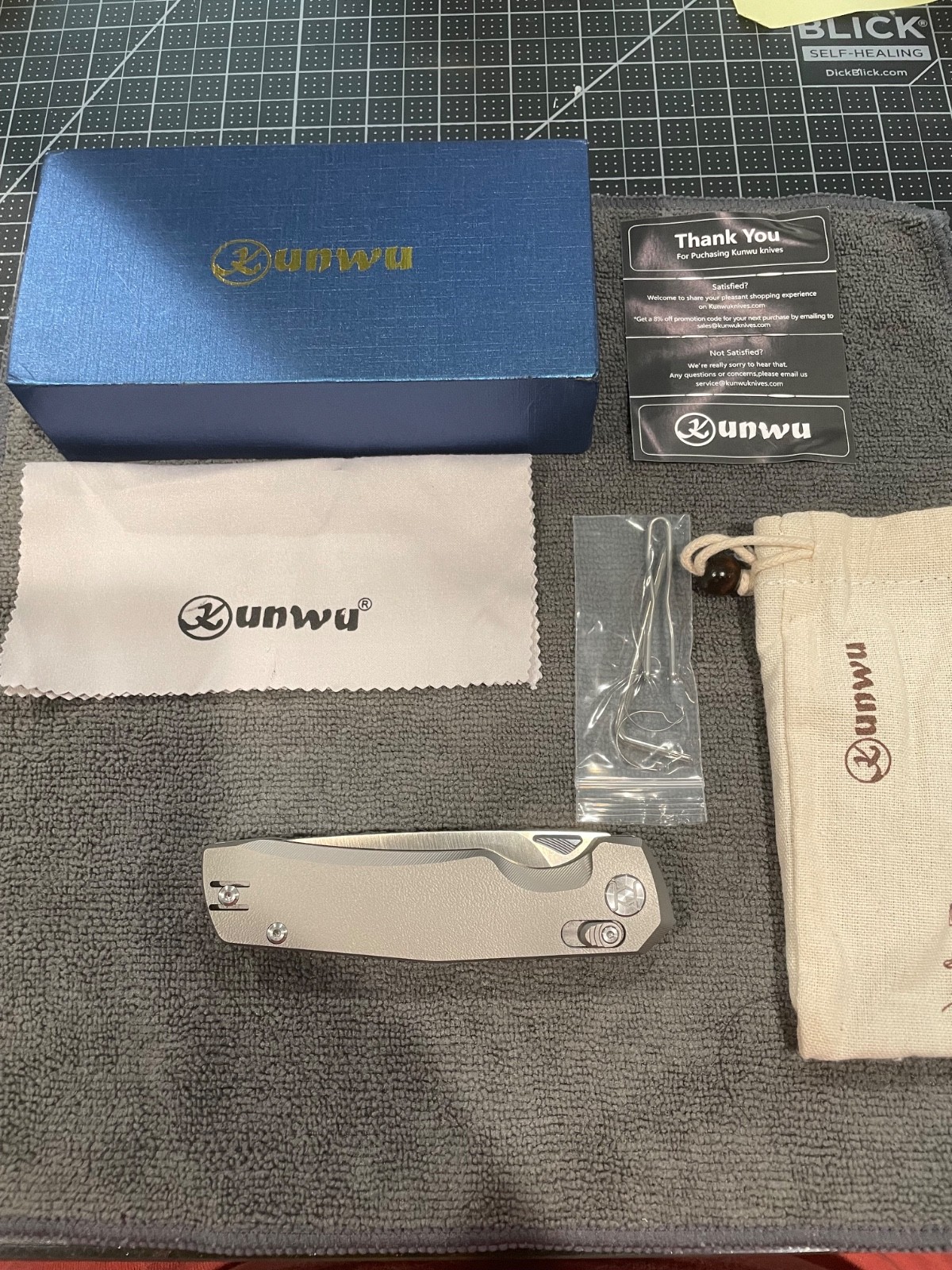 KUNWU X703T X-TAO with Titanium scales