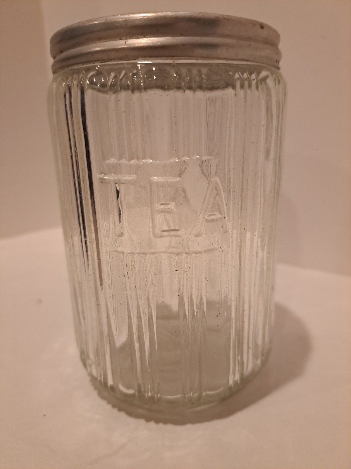 Hoosier Clear Glass Tea Jar Canister Aluminum Lid Raised letters Ribbed
