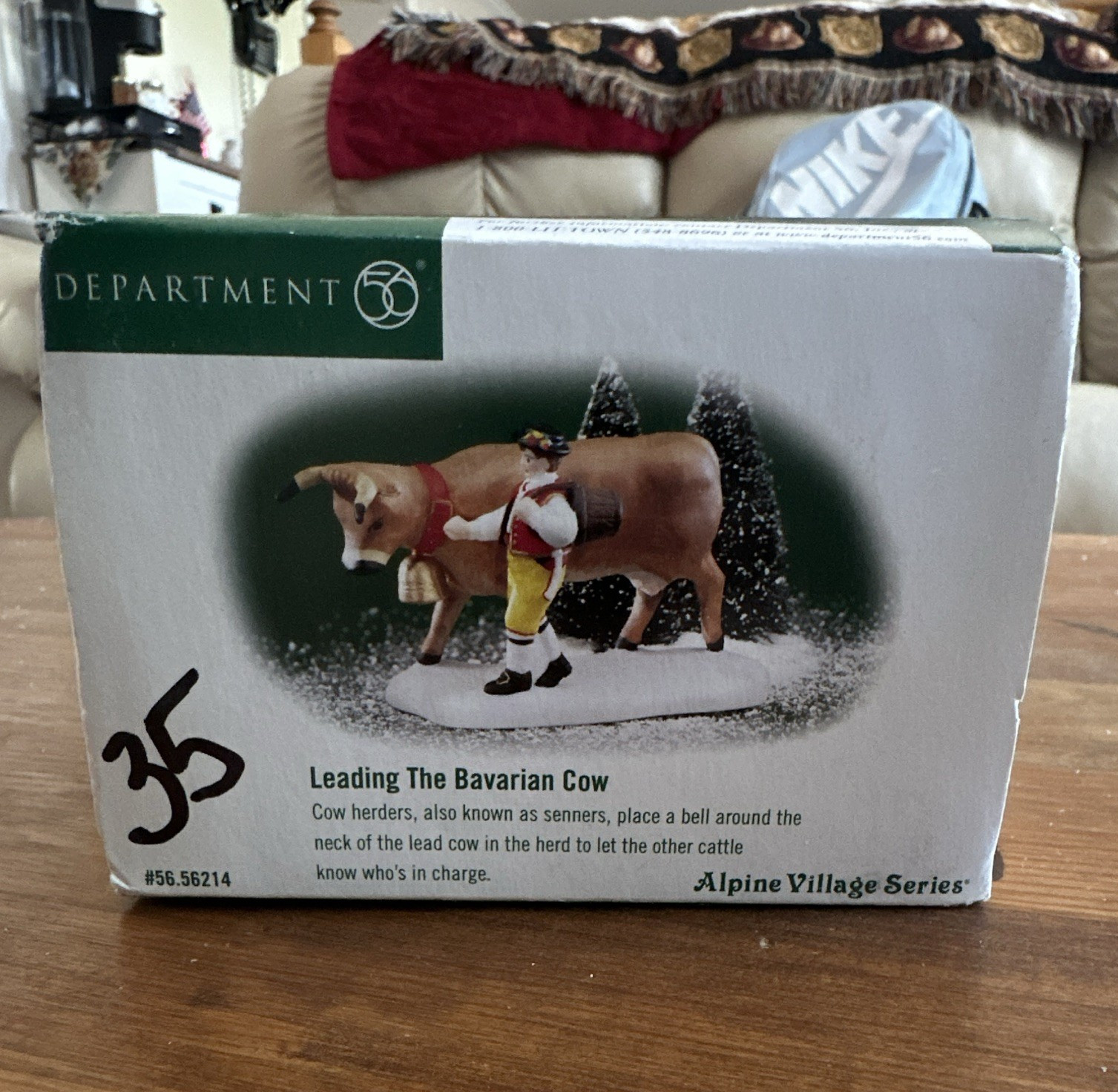Department 56 Alpine Village Leading The Bavarian Cow Figurine, Boxed