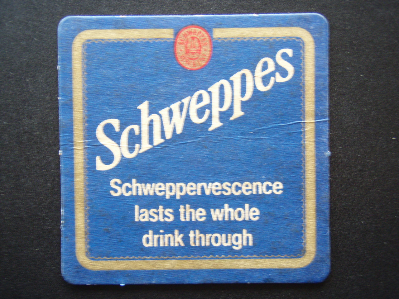 SCHWEPPES SCHWEPPERVESCENCE LASTS THE WHOLE DRINK THROUGH EMPIRE BOTTLE COASTER