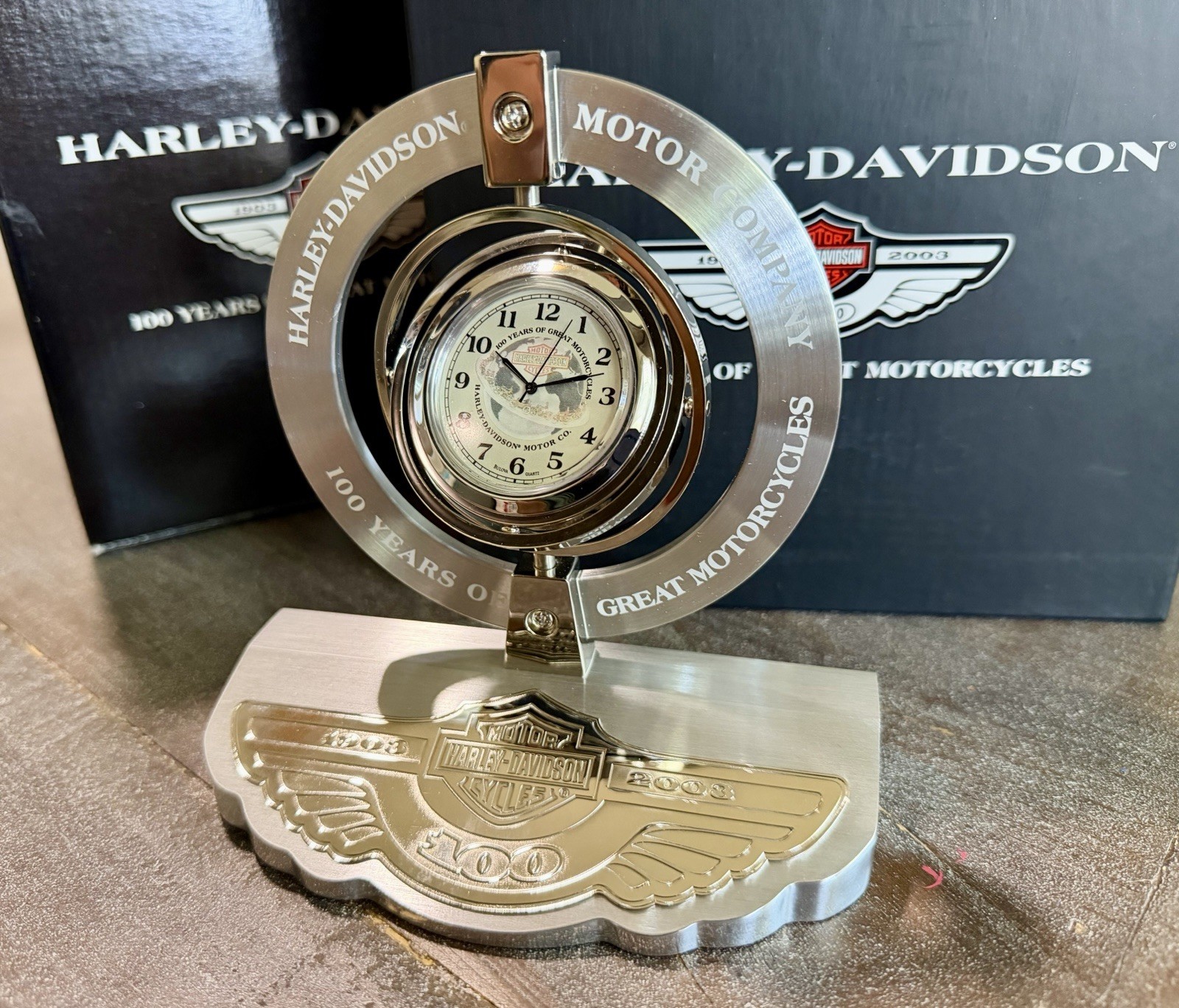 NEW NOS Harley Davidson 100th Anniversary Bulova Rotating Desk Clock Silver 2003