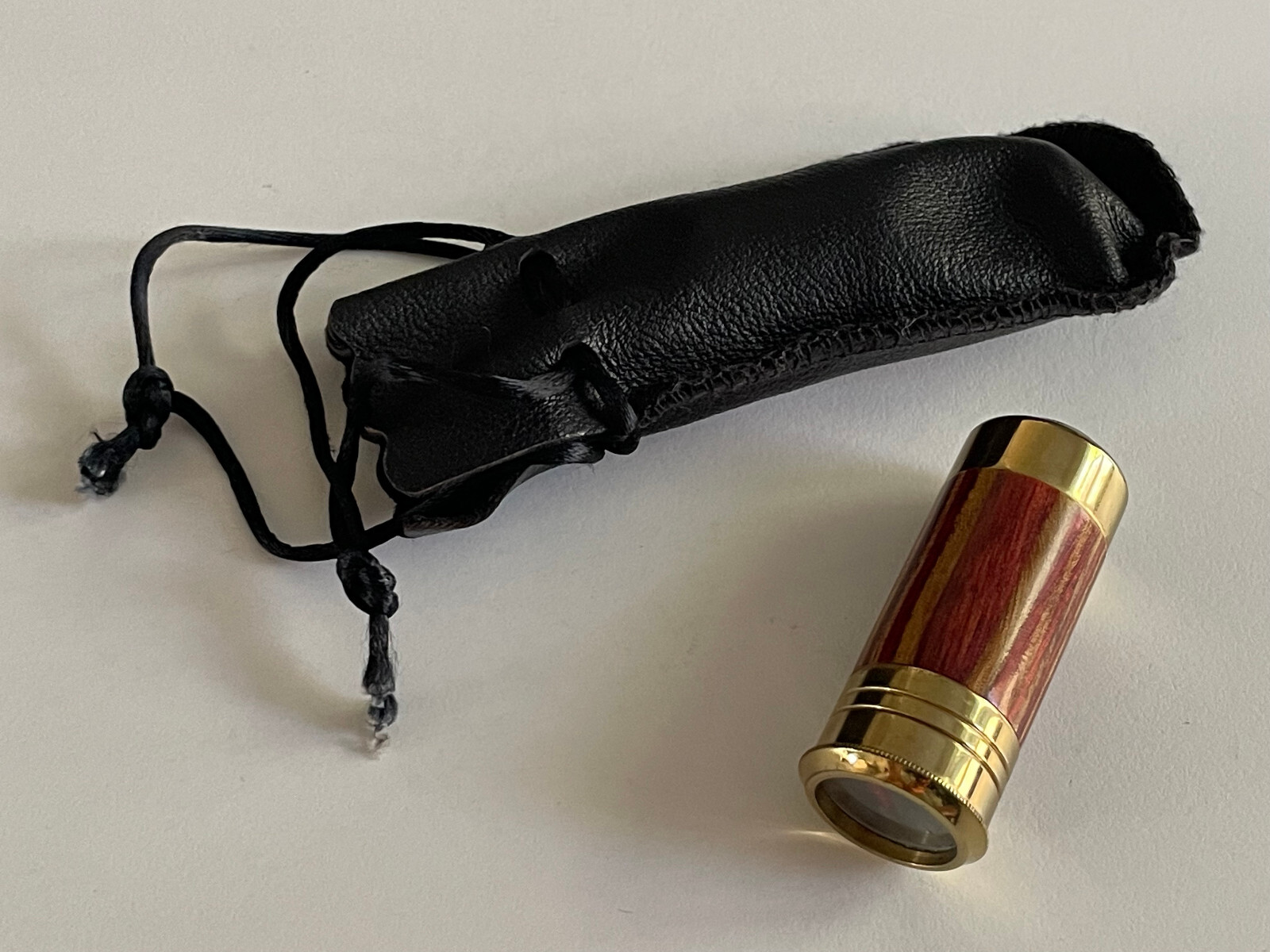 VAN CORT INSTRUMENTS DERRINGER BULLET SHAPE KALEIDOSCOPE WOOD BRASS LEATHER BAG