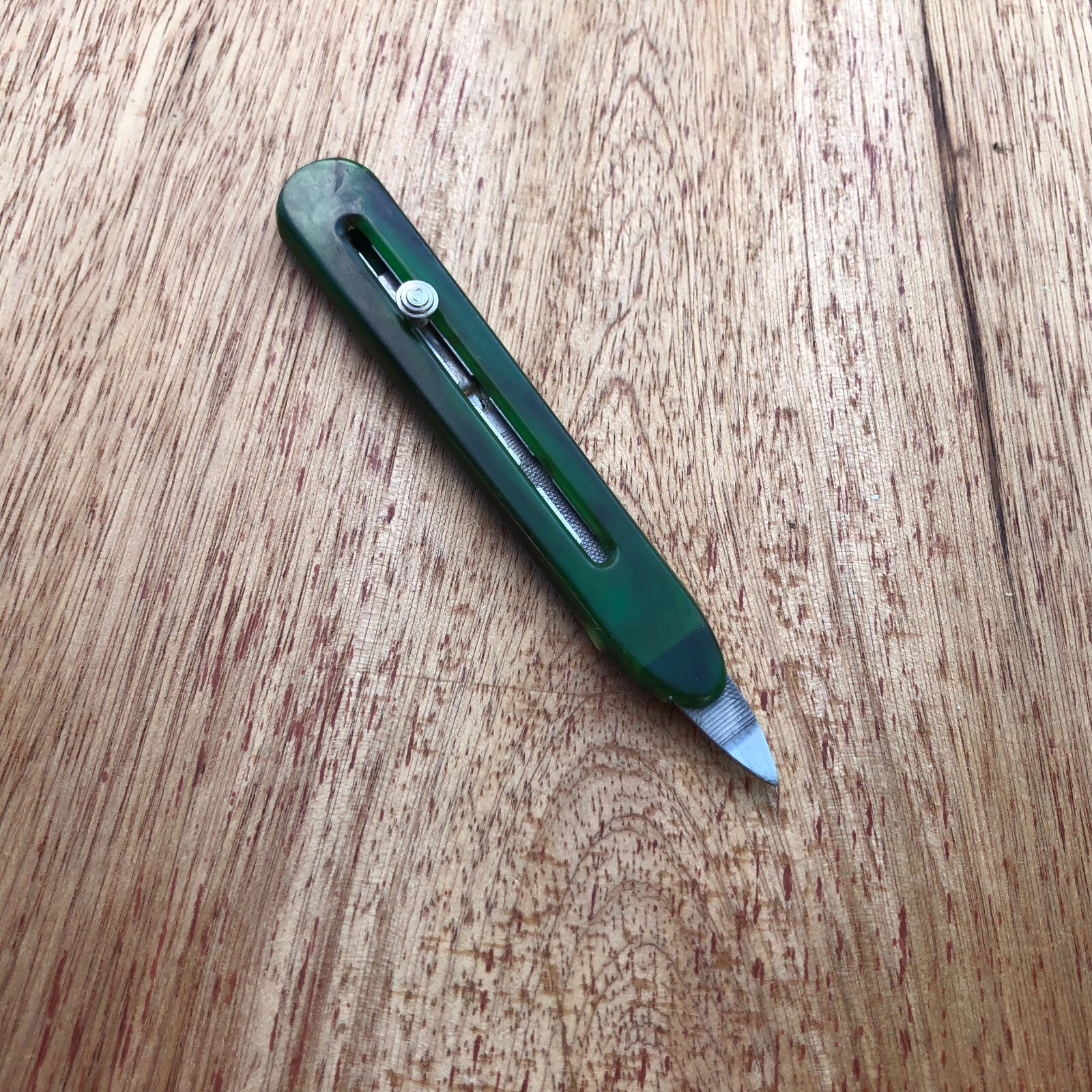 Retractable Nail File Green Plastic Bakelite Celluloid Vintage Advertising Rough