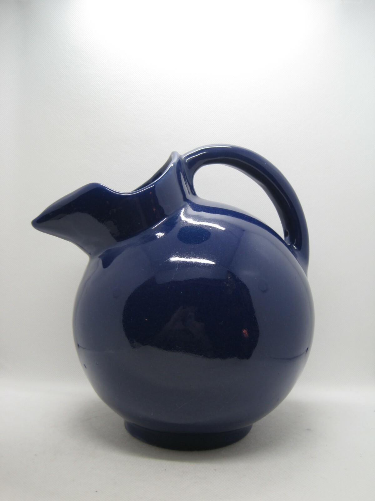 Vintage Large 72 ounce Ceramic Cobalt Blue Footed Ball Pitcher
