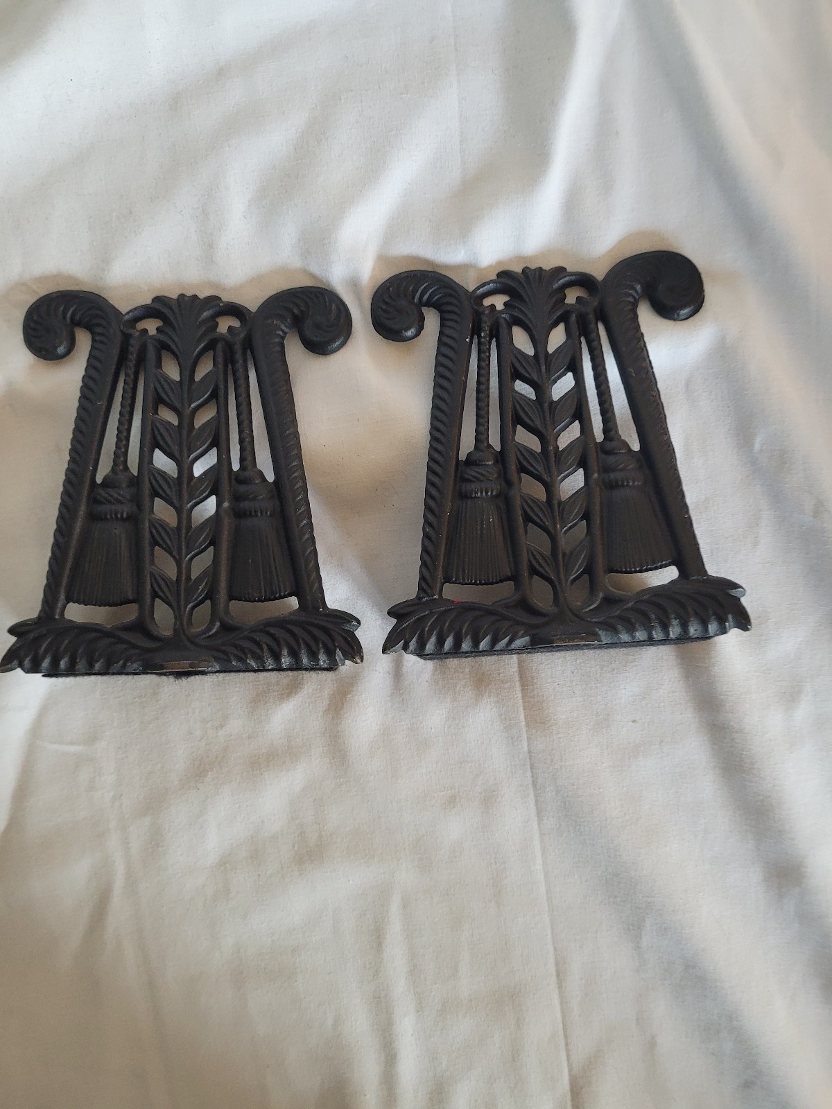 Vintage cast iron black tassel bookends