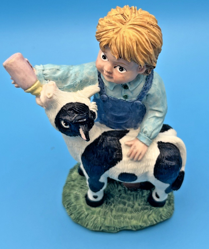 Boy Feeding Baby Cow with bottle Figurine 4.5″ Tall Youngs Inc gift Farm